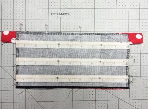How to sew a zipper into a pencil pouch. A detailed tutorial from DIY Crush