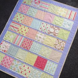 DIY Appliquéd Strip Quilt