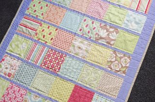 DIY Appliquéd Strip Quilt. This quilt is made using a faux quilting technique