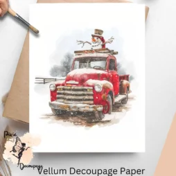 One image of a red truck with a snowman in the back.