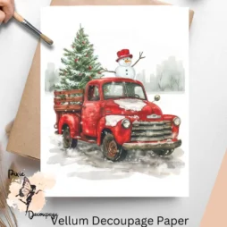 Image of a red truck with greenery and a snowman.