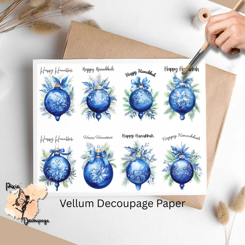 Eight images of blue baubles and the text 'happy hanukkah'